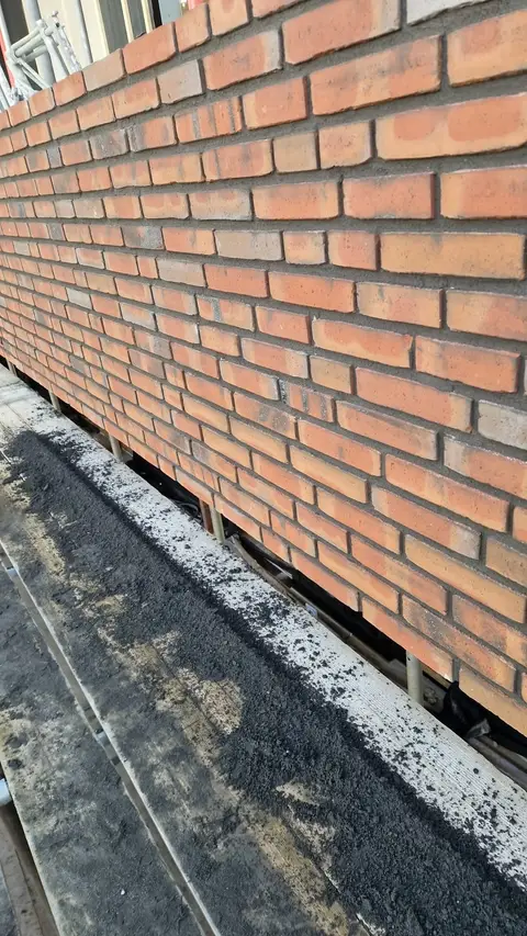 Baksteen detail met waterdichting